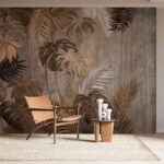 Papel de parede Elegantes folhas tropicais num fundo texturado.