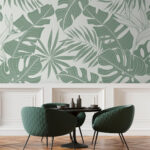 Papel de parede Padrão de folhas tropicais, tons verdes suaves.