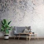Papel de parede Padrão elegante de folhas com tons suaves.