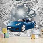 Papel de parede O carro azul rebenta com uma parede de tijolo.