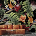 Papel de parede Padrão floral tropical sobre fundo preto.