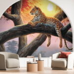 Papel de parede Leopardo a descansar numa árvore ao pôr do sol.