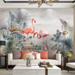Papel de parede Flamingos entre folhagens tropicais.