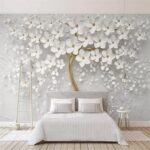Papel de parede Árvore elegante com flores brancas.