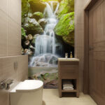 Papel de parede Cascata serena no meio de uma vegetação luxuriante.