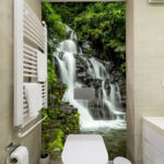 Papel de parede A água corrente desce em cascata pelas rochas.