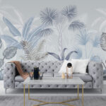 Papel de parede Folhas tropicais em tons suaves.