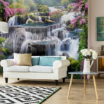 Papel de parede Cascata encantadora no meio de flores vibrantes.