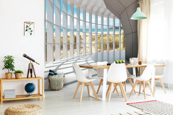 Papel de parede Vista solarenga para a praia através de janelas geométricas