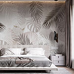 Papel de parede Design elegante de folhagem tropical em tons neutros.