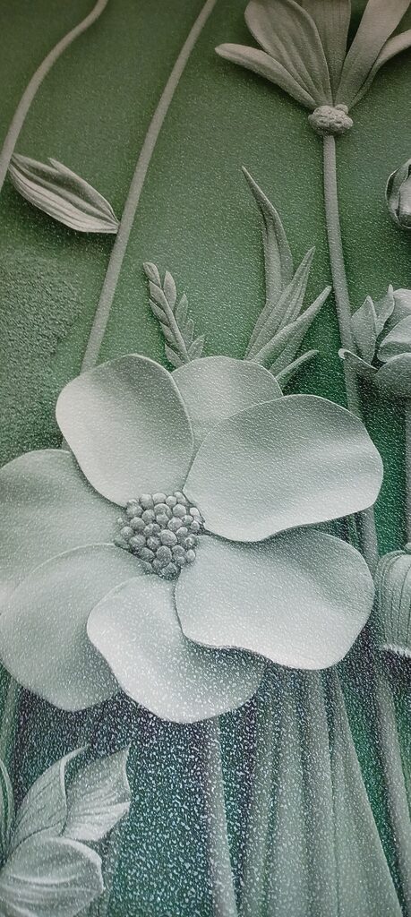 Papel de parede Escultura cinzenta de flores e plantas